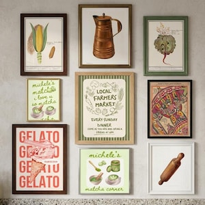 A gallery wall of ten framed botanical and food art prints including a pear, a coffee pot, gelato, and matcha on a light neutral wall.