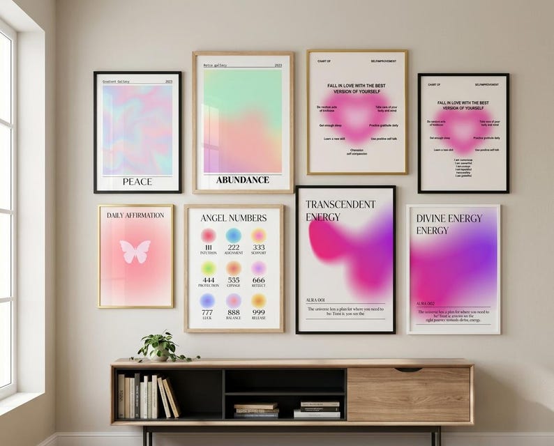 May include: A gallery wall featuring eight framed posters with gradient backgrounds, butterfly motifs, and text including Peace, Abundance, Angel Numbers, and Divine Energy. The prints display soft, blurred color fields in pink, purple, and green.