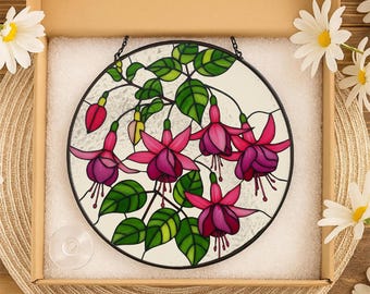 Atrapasueños de cristal con forma de flor fucsia: vibrante decoración tropical para colgar en la ventana.