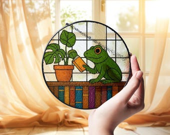 Atrapasueños de rana de cristal, arte de ventana con rana lectora, regalo para amantes de los libros, decoración de ranas y plantas, regalo para amantes de los animales, decoración del hogar con ranas, regalo para mamá