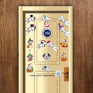 May include: A light-colored door featuring a circular window with the number 12358, adorned with various Dalmatian puppy stickers in holiday and seasonal costumes, including Santa hats, witch hats, and pumpkins, with the text * Each Sold Separately.