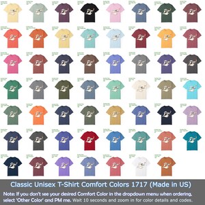 Puede incluir: Una cuadr&iacute;cula de camisetas unisex de varios colores. Cada camiseta presenta un gr&aacute;fico blanco de un p&aacute;jaro estilizado. El texto en la parte inferior dice "Classic Unisex T-Shirt Comfort Colors 1717 (Made in US)".