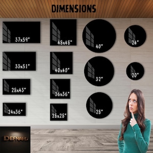 May include: A wall display of various sizes of black framed artwork with white geometric designs and the word "DIMENSIONS" at the top. The artwork is displayed in a room with wood paneling and a wooden floor.