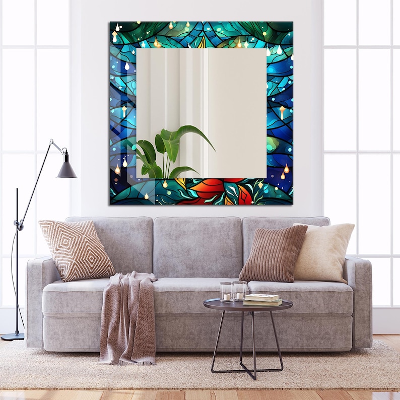 May include: A square mirror with a colorful stained glass frame featuring blue, green, and red floral designs. The frame has a textured, swirling pattern with white accents.