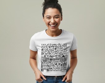 エチオピアの図像をモチーフにした落書き風コラージュ柄のレディースベビーTシャツ