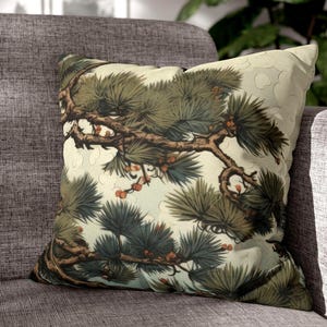 May include: A white ceramic mug with a black handle and the text "But First, Coffee" in a bold, black font. The mug is set against a neutral background, highlighting its simple design.