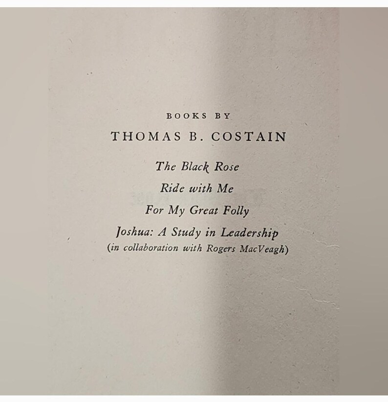 Puede incluir: Una portada de libro con el t&iacute;tulo "BOOKS BY THOMAS B. COSTAIN" y una lista de libros del autor, que incluyen "The Black Rose", "Ride with Me", "For My Great Folly" y "Joshua: A Study in Leadership (in collaboration with Rogers MacVeagh)".