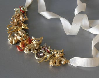 Cat lady statement necklace from vintage kitty pins. Get crazy for charity, 30% of sale is donated.