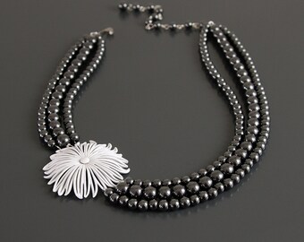 Polished to Perfection. Vintage Enamel Flower and Hematite Necklace.