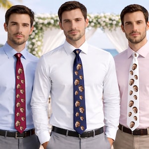May include: Three dress shirts paired with neckties featuring a repeating pattern of a man's face. The ties are burgundy, navy blue, and white, worn with light blue, white, and light pink button-down shirts and grey or tan trousers.