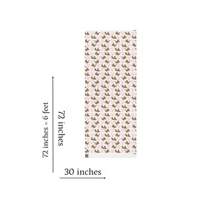 May include: A rectangular yoga mat with a repeating pattern of brown animals and pink hearts on a white background. The mat measures 72 inches long and 30 inches wide.