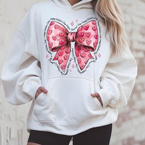 Valentine&#39;s Day Pink Heart Bow Hoodie | Cute and Cozy Gift for Her | Romantic Love Design | Print on Demand Women&#39;s Hoodie
