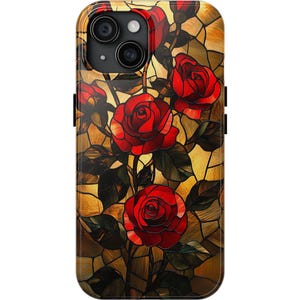 May include: A phone case with a stained glass design featuring red roses on a gold background.