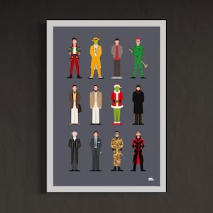 Peut inclure: Une affiche encadrée présentant des illustrations stylisées de personnages en tenues colorées. Les personnages sont disposés en rangées sur un fond gris. L'affiche est dans un cadre blanc et comprend une petite signature en bas à droite.