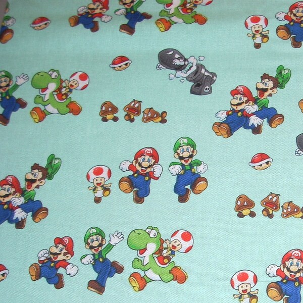 Super Mario Bros. and Characters on cotton fabric - 15 INCHES WIDE and 44 inches long ( Free Shipping)