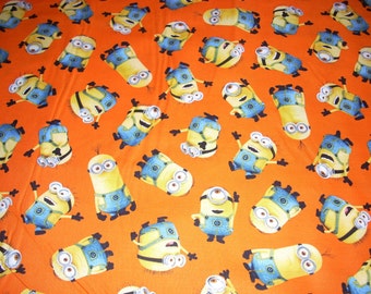 Minions on orange - 1 in a Minion - by Quilting Treasures - Character Fabric - cotton fabric - 44" wide - sold by the yard