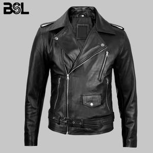 May include: A black leather motorcycle jacket featuring an asymmetrical front zip, a notched lapel with silver-tone snaps, multiple zipped pockets, a small flap pocket with a snap button, and an adjustable waist belt with a metal buckle.