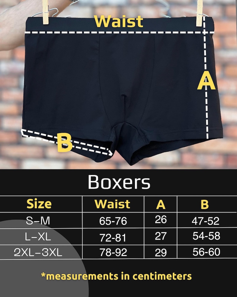 May include: Black boxer briefs with a size chart overlay. The image displays the garment with dashed lines labelled Waist, A, and B. A table below lists sizes S-M, L-XL, and 2XL-3XL with corresponding measurements in centimetres for Waist, A, and B.