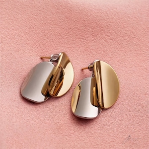 Pendientes ovalados entrelazados / Pendientes colgantes bicolor en oro y plata / Joyería minimalista moderna