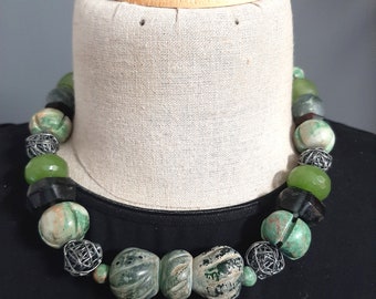 Vintage Bohemian designer necklace with old green Islamic glass, Jadeite beads, glass beads and silver wire beads.