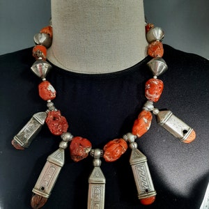 Vintage Moroccan Berber necklace with silver coral caps and large sized natural Mediterranean red rough coral beads.  Tribalgallery