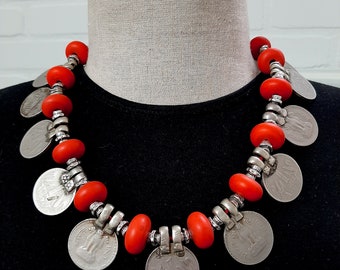 Lovely large silver Indian Rupee coins and pinkish-red donut glass beads necklace. tribalgallery