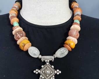 Artisan vintage African trade beads necklace with a silver Boghdad Berber cross pendant.  Tribalgallery
