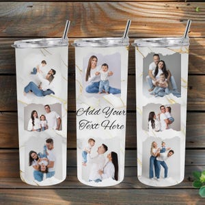 May include: A white tumbler with a gold marble pattern featuring multiple rectangular photo frames displaying family portraits and the text Add Your Text Here in black script. The cylindrical container includes a clear lid and a metal straw.