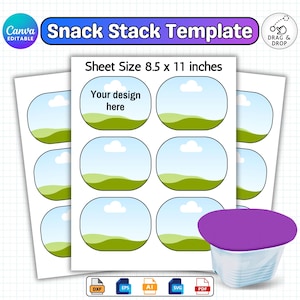 May include: A template for snack stack labels with a blue sky and green landscape design. The sheet size is 21.6 x 27.9 cm. The text "Your design here" is visible. A purple-lidded container is in the image. The Canva logo is in the upper left corner.