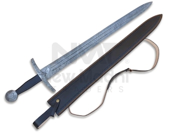 May include: A silver sword with a black handle and a leather scabbard with a brown strap. The sword has a decorative pattern on the blade.
