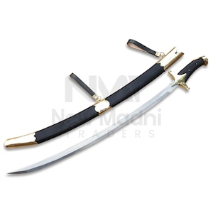 May include: A black and gold sword with a curved blade and a black leather scabbard. The sword has a gold hilt and a gold tassel.