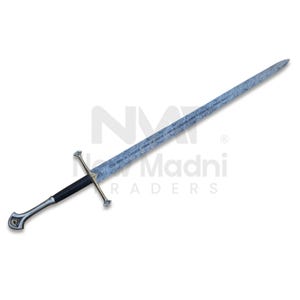 May include: A long, ornate sword with a patterned blade and a black handle. The sword features a silver crossguard and pommel, and the blade has etched details. The sword is displayed against a white background.