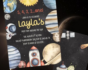 May include: Space-themed invitation with planets, a rocket, and an astronaut. The invitation reads "Layla's First Trip Around the Sun" and includes event details. Additional card features a satellite, comet, and alien.