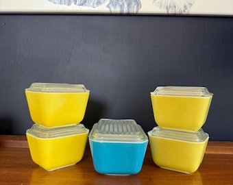 Assortment of Vintage Pyrex Refrigerator Dishes with Lids