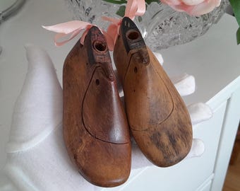very cute little antique shoe trees for children's shoes.