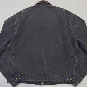 Chaqueta Carhartt j97 Detroit vintage: ropa de trabajo reciclada con lavado a la piedra en color negro. imagen 4