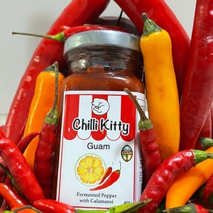 Fermented Denanche (Chili Paste) with Calamansi. Guam Product: Chili Kitty (rebrand of Red Mama). Mild Spicy. Great Gift. 1 Bottle