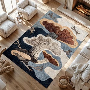 Könnte beinhalten: Ein blauer, weißer und brauner Teppich mit einem Pilz-Design. Der Teppich hat ein wellenförmiges Muster und ist aus einem weichen, strukturierten Material gefertigt.