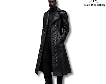 May include: A black leather trench coat with gold buttons and brown trim. The long coat has a double-breasted design and a high collar. The image also includes the text "MADE IN LEATHERS".