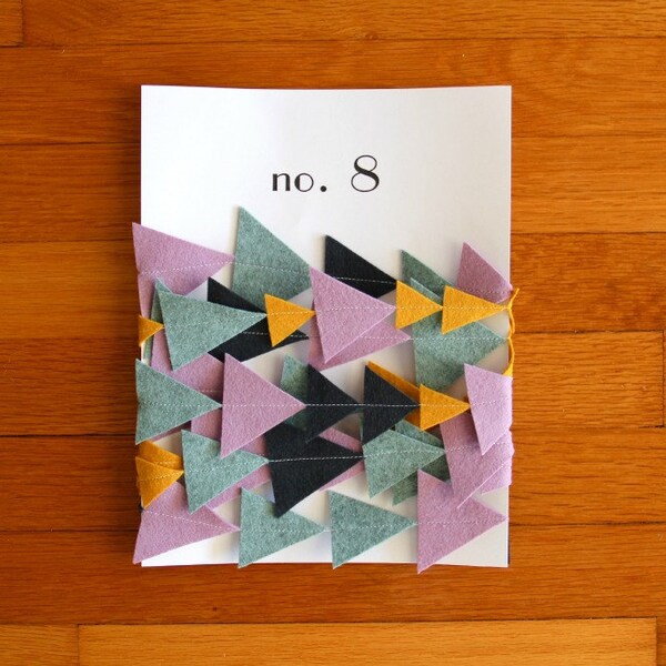 no. 8 geometric triangle bunting in navy, mustard, rainstorm, and lilac (one of a kind)