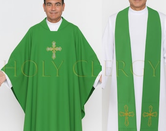 May include: A green chasuble and stole set. The chasuble features a gold cross design and the text "HOLY CLERGY". The stole has two gold crosses. Both garments are worn over white robes.