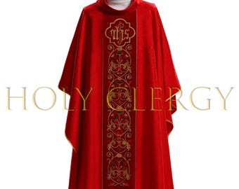 May include: A red liturgical vestment with gold embroidery and trim. The front features a vertical panel with floral and IHS designs. The garment has a high collar and is displayed on a mannequin. The text "HOLY CLERGY" is visible.