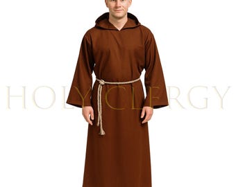 May include: A brown hooded robe with long sleeves and a rope belt. The robe is worn by a person standing in front of a white background. The text "HOLY CLERGY" is visible in the background.