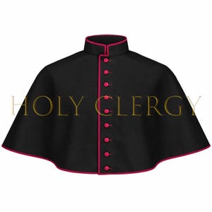 May include: A black clerical cape with a high collar and a row of buttons down the front. The edges and buttons are a vibrant pink. The text "HOLY CLERGY" is printed in gold across the front of the cape.