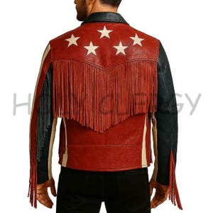 May include: Red leather jacket with white stars on the back and fringe detailing. The jacket has black sleeves and cream-colored stripes on the sides. A classic western-inspired design.