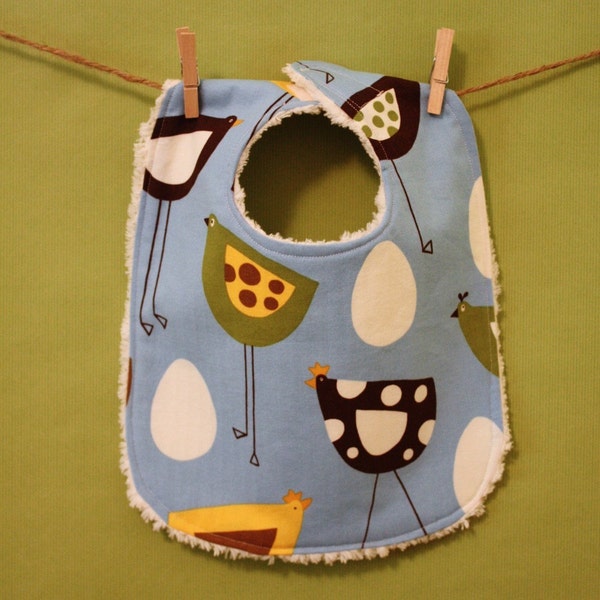 The Dressy Drooler Bib in Blue Metro Market Chicks