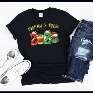 Merry X-Mess 2020 / Volto di Babbo Natale / Rotolo di carta igienica con mascherina / Quarantena / Natale / Maglietta / Canotta / Felpa / Felpa con cappuccio