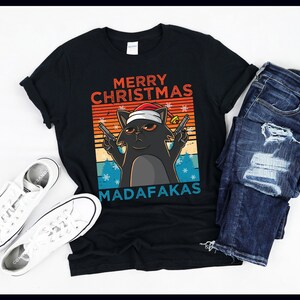 Vrolijk kerstfeest madafaka's | Zwarte kitten kat met kerstmuts | Pew Pew-geweren | Kerstmis | T-shirt | Tanktop | Sweater | Hoodie
