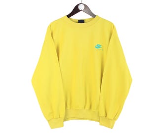 pastel yellow nike crewneck