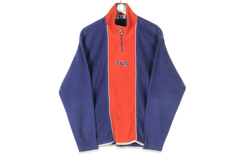 May include: A distressed wooden sign, inscribed with 'Welcome to our home' in white lettering. The sign has a rustic finish, ideal for a porch or hallway, creating a welcoming atmosphere.